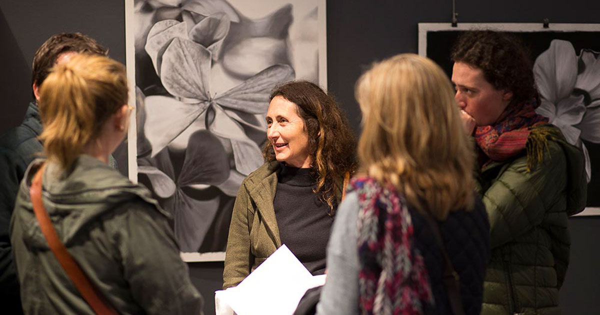 Guests enjoying an Art Gallery exhibition opening